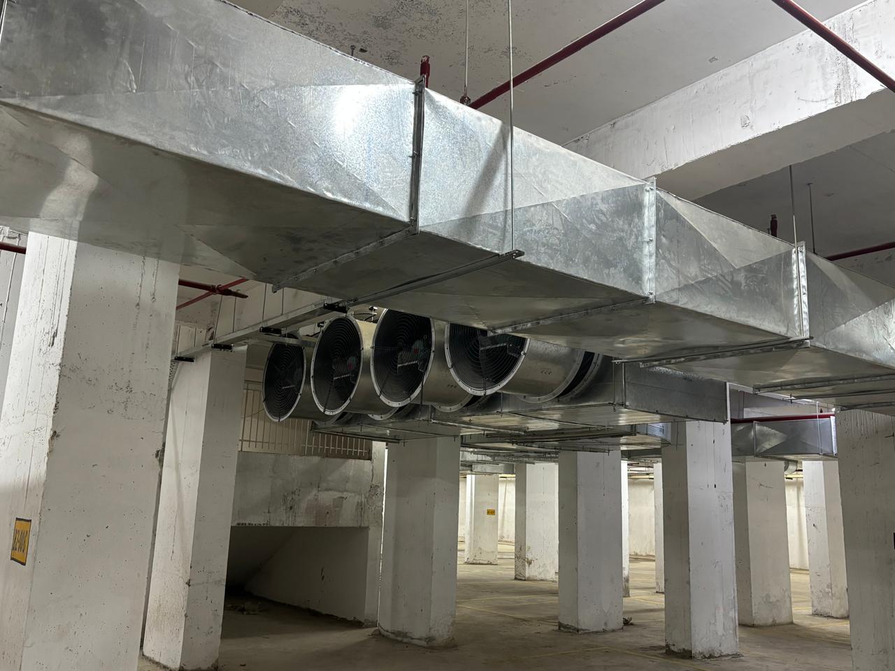 Installed ventilation fan bank and coordinated ductwork